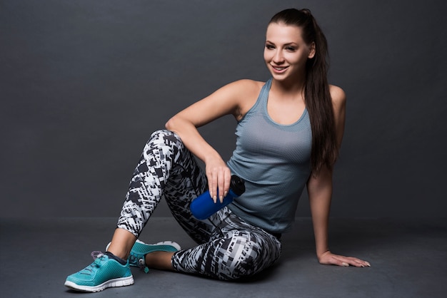 Brunette woman wearing sport clothes