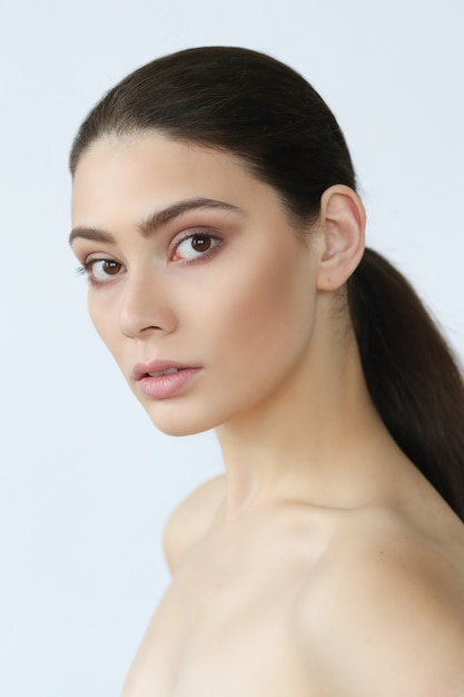 Brunette young woman posing