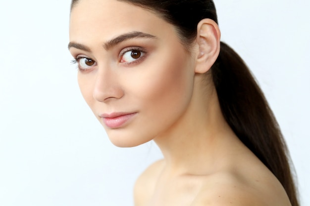 Brunette young woman posing