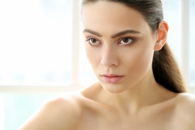 Brunette young woman posing