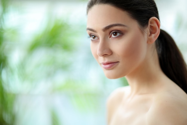 Brunette young woman posing