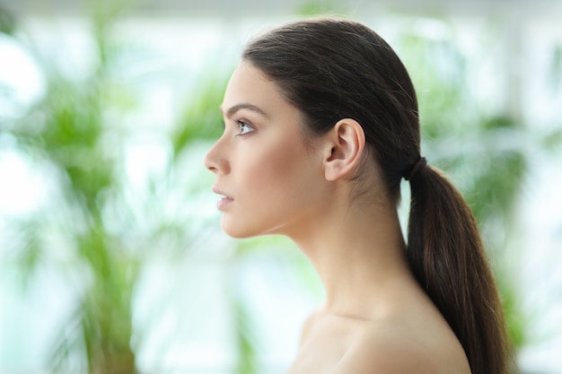 Brunette young woman posing