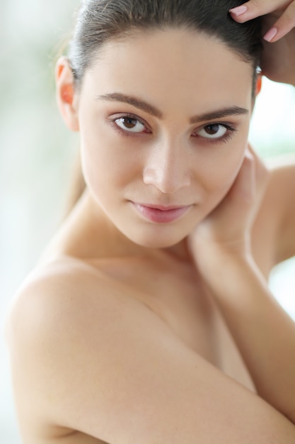 Brunette young woman posing