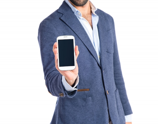 Brunetteman showing a mobile over white background