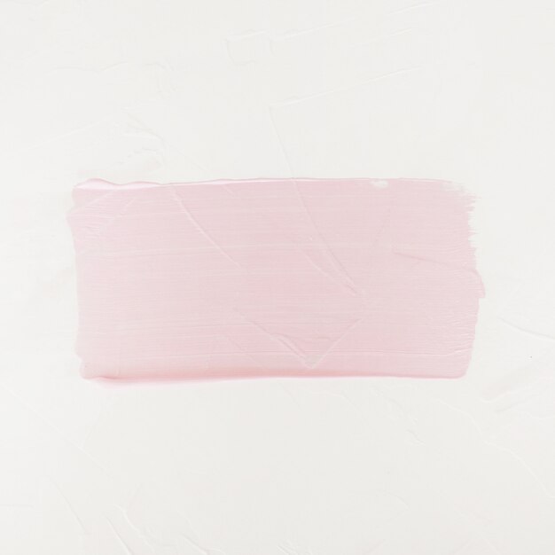 Brush Stroke. Acrylic Paint Stain. Pink Color Stroke of the Paint Brush Isolated on White