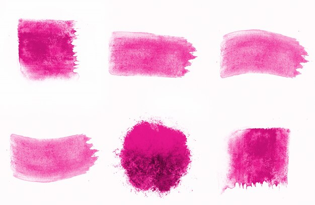 Brushes composition of dark pink watercolors