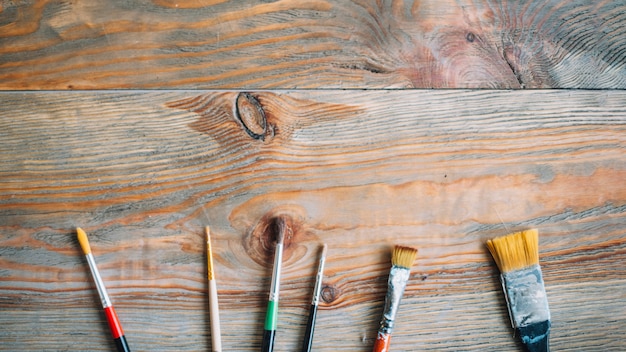 Brushes on wooden surface