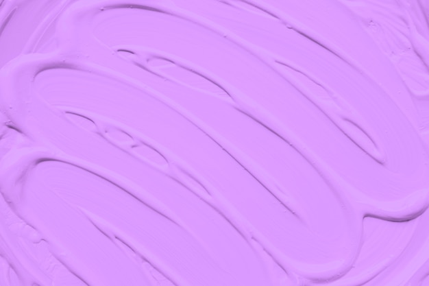 Brushstrokes on pink smooth paint