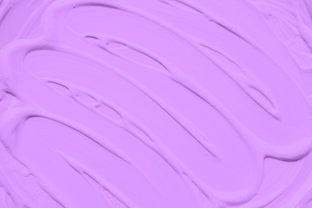 Brushstrokes on pink smooth paint