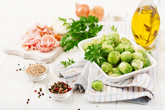 Brussels sprouts. Preparation for roasting Brussels sprouts with bacon.