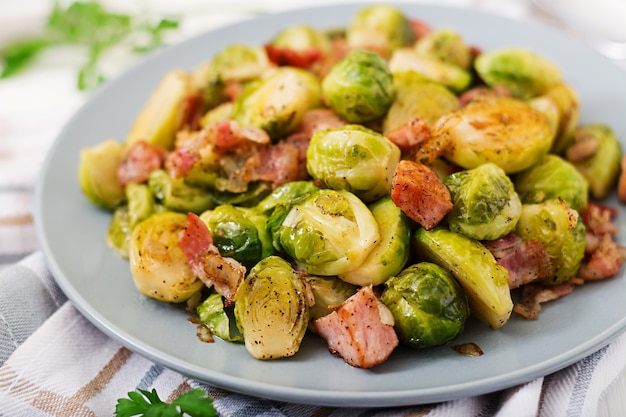 Brussels sprouts. Roasted Brussels sprouts with bacon. Delicious lunch.