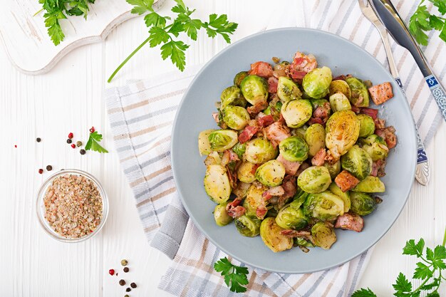 Brussels sprouts. Roasted Brussels sprouts with bacon. Delicious lunch.