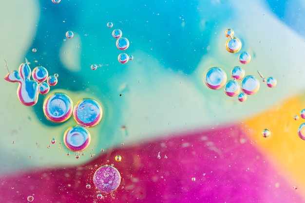 Bubbles over the blue and pink textured background