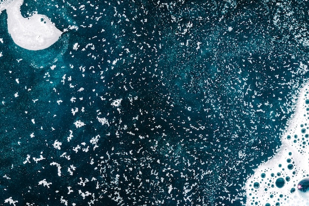 Bubbles and flakes on ocean water