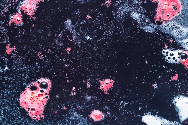 Bubbles of pink and blue foam