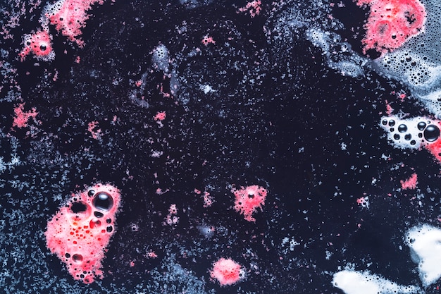 Bubbles of pink and blue foam