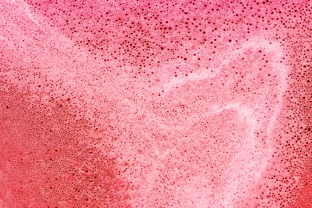 Bubbles in red colored liquid
