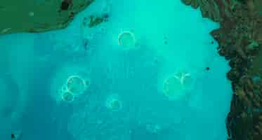 Foto gratuita bolle sopra lo sfondo texture vernice turchese e verde