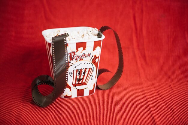 Bucket with popcorn and film