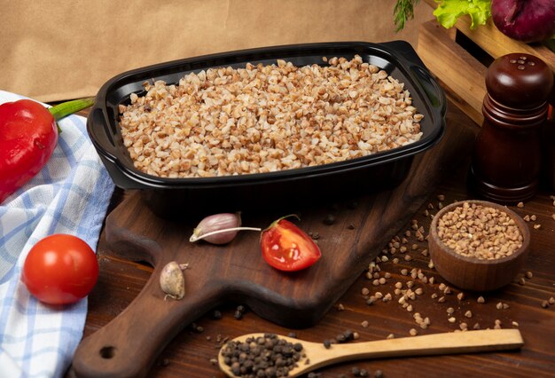 Buckwheat meal takeaway in black plastic container