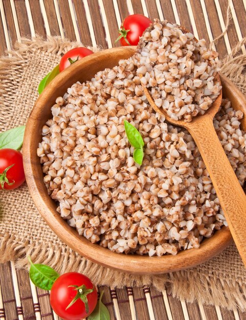 Buckwheat porridge in a wooden bowl