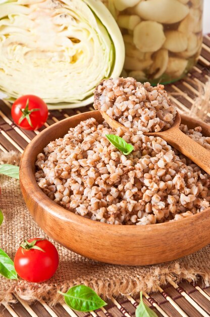 Buckwheat porridge in a wooden bowl