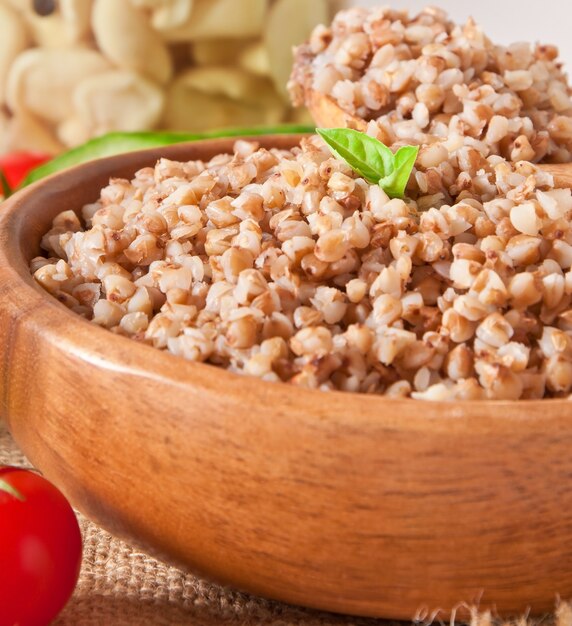 Buckwheat porridge in a wooden bowl