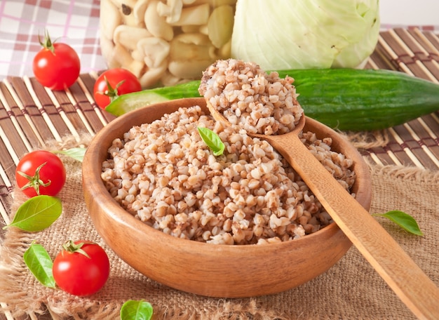 Buckwheat porridge in a wooden bowl