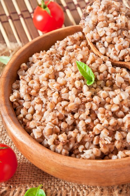 Buckwheat porridge in a wooden bowl