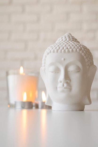 Free photo buddha figurine still life