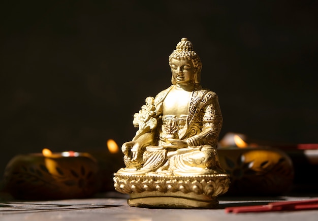 Free photo buddha figurine still life