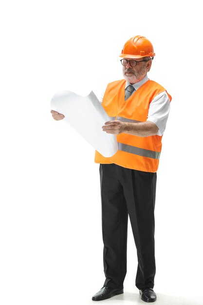 The builder in orange helmet isolated on white