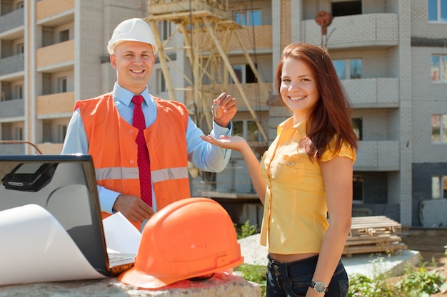 Builder presents the keys to girl