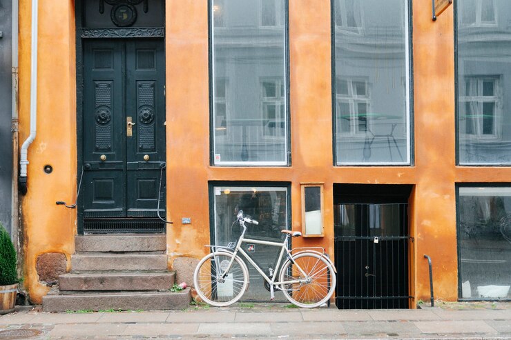 Free Photo building exterior with parked bicycle