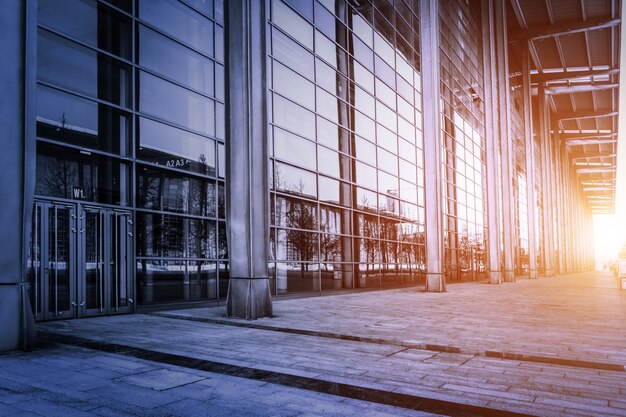 Building with glass walls at sunset