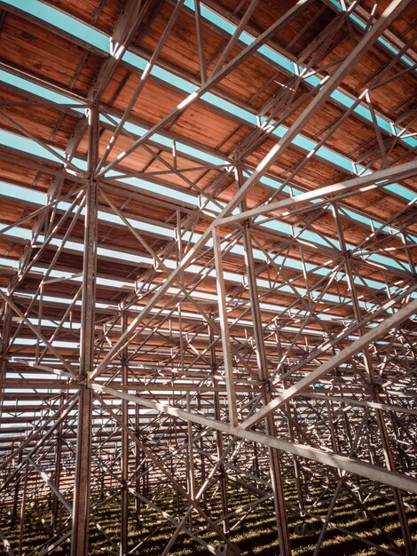 Building with metallic bars and wooden ceiling