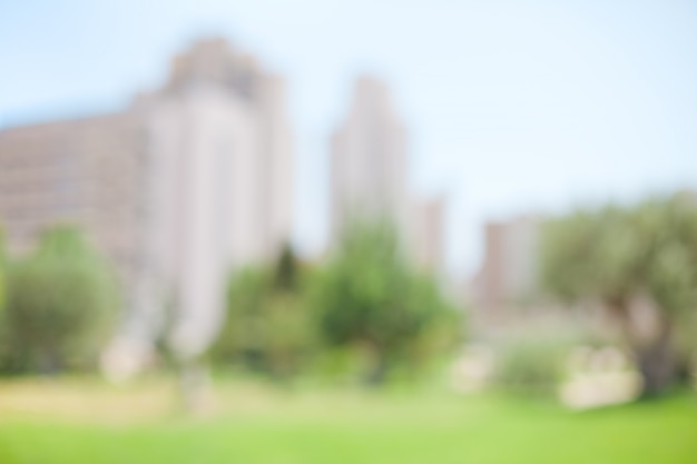 Buildings with a park in front of them