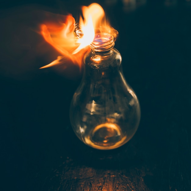 Free photo bulb burning with fire