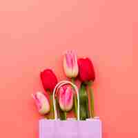 Free photo bunch of colorful tulips in craft packet