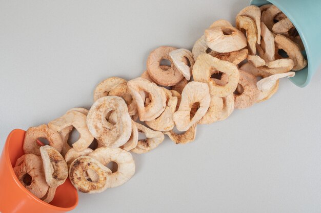 Bunch of dried fruit slices in bowls