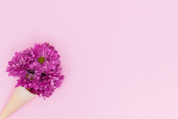 Bunch of flowers in waffle cone