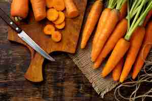 Free photo bunch of fresh carrots arrangement