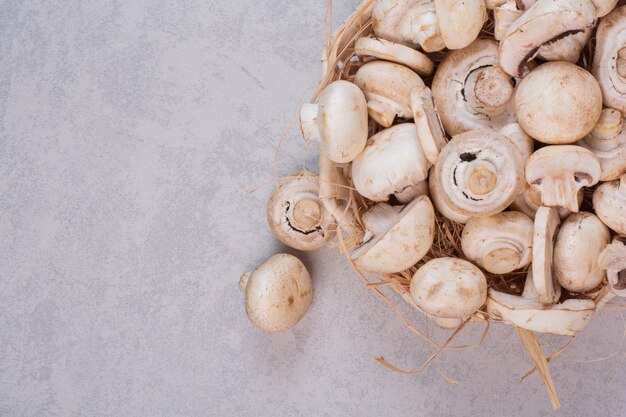 Bunch of fresh mushrooms in wooden basket