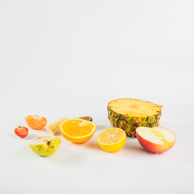 Free photo bunch of halved fruits