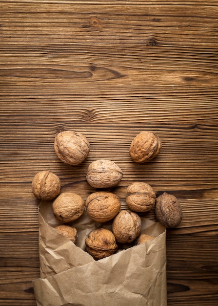 Bunch of nuts on wooden background