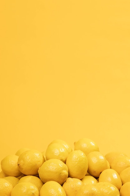 Bunch of raw lemons with copy space
