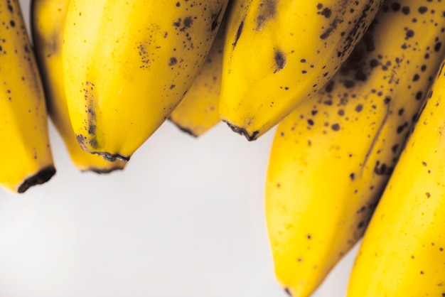 Free photo bunch of ripe yellow bananas