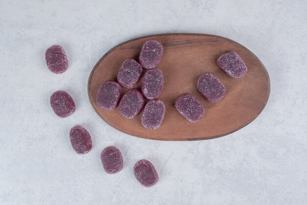 Bunch of sweet marmalades on gray background. High quality photo