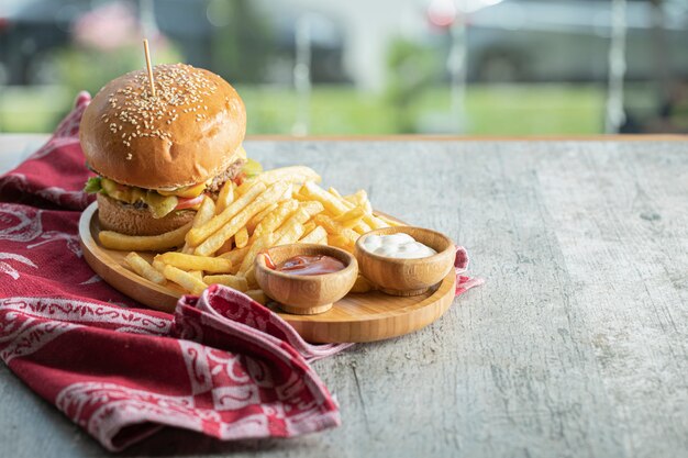 Burger menu in a wooen platter