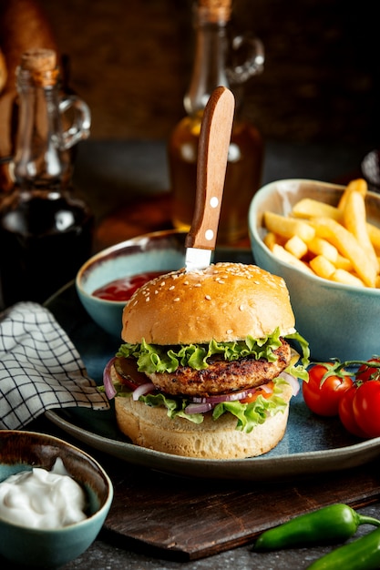 Burger with french fries and ketchup